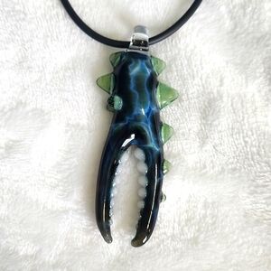 Glass crab claw pendant
